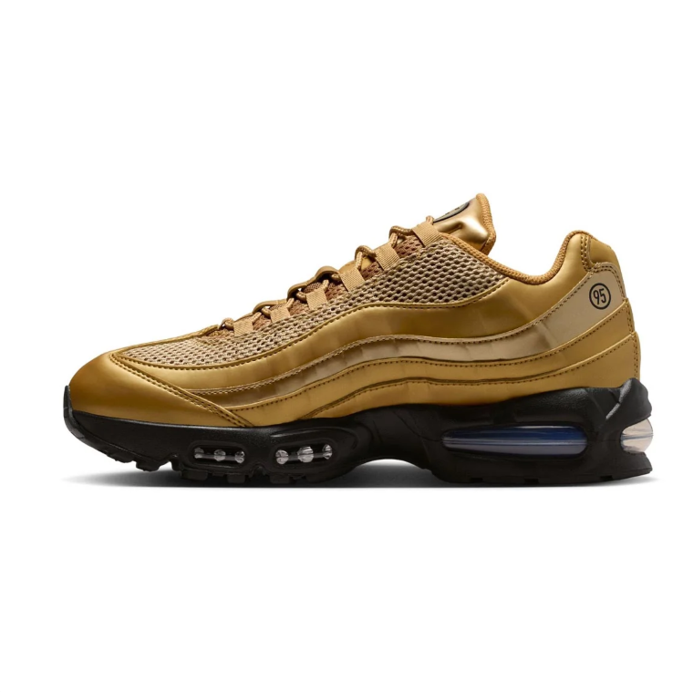 Nike Gold-Tone Sneakers with Black Sole and Visible Air Windows
