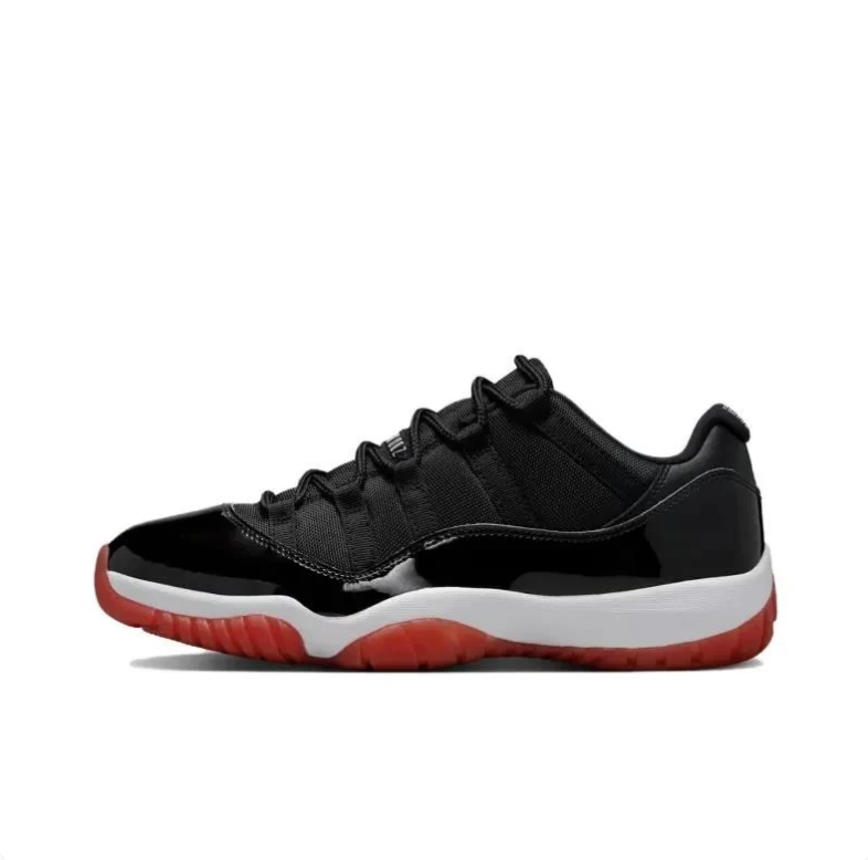 Jordan Black Low-Top Sneakers with Glossy Panels and Red Outsole