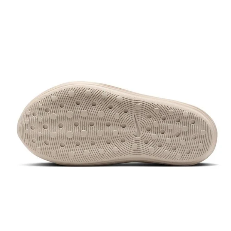 Nike Beige Slip-On Clogs with Vent Holes and Wave-Ridged Sides